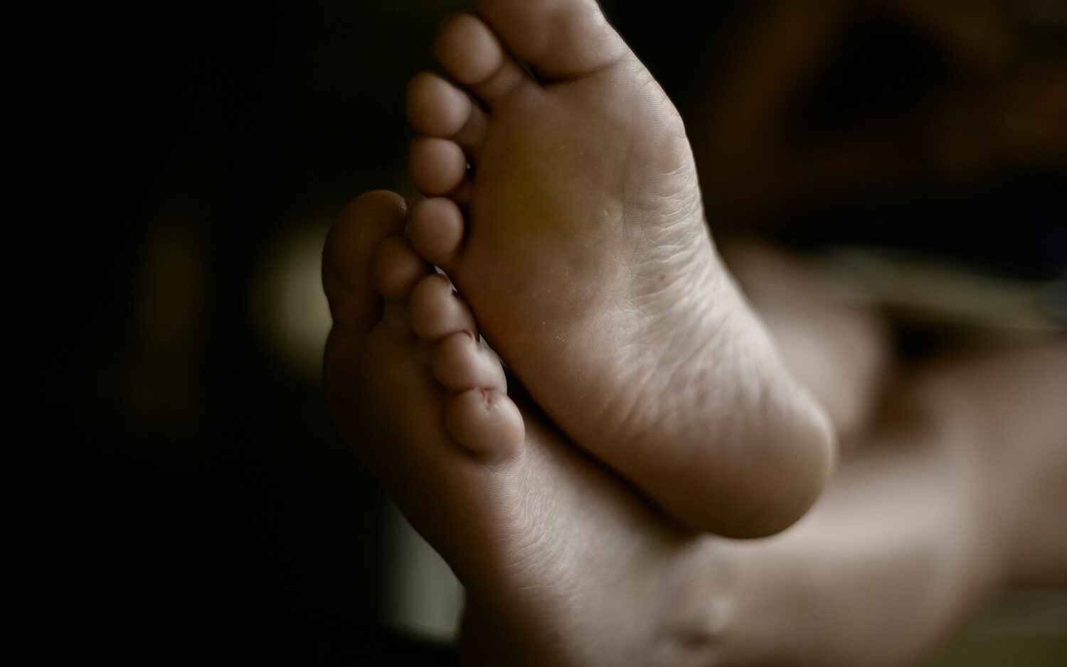 a close up of a person's bare feet