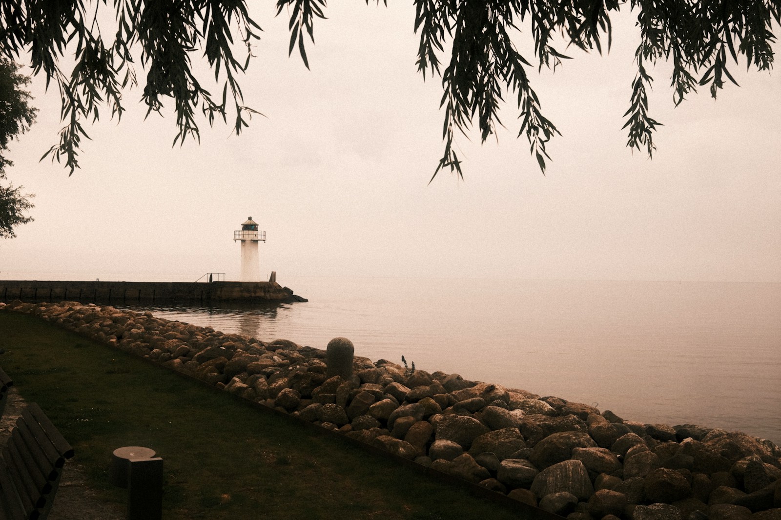 a lighthouse on a rocky shore